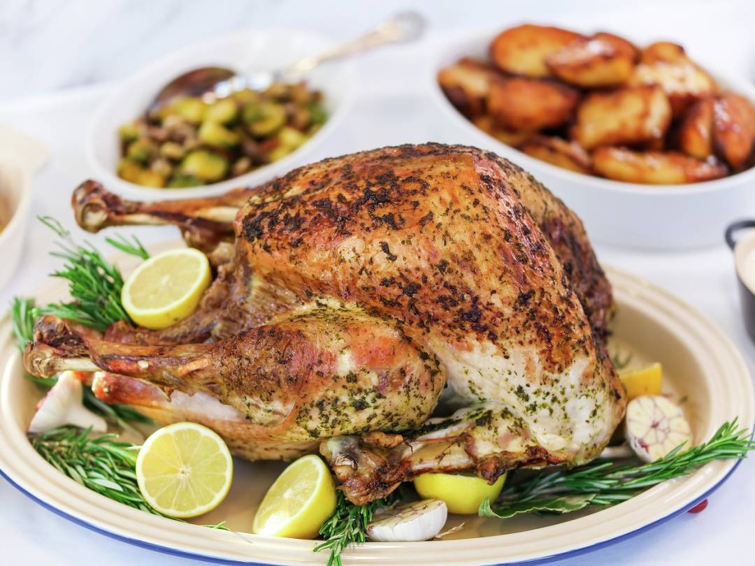 Christmas Roast turkey with lemon and herb butter landscape