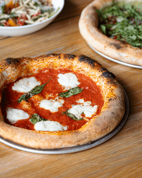 Wood-fired Margherita pizza with mozzarella and basil at Pizza East Shoreditch