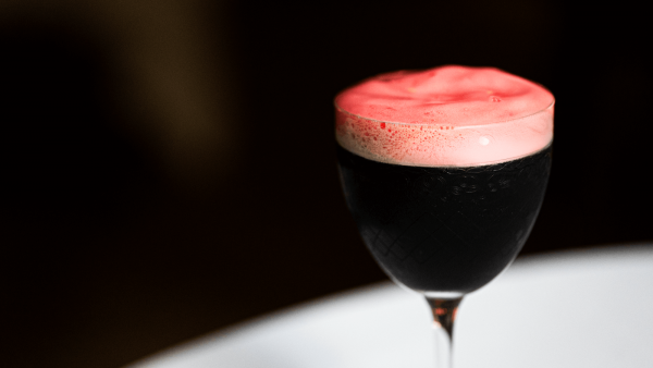 A close-up view of The Backstage Kiss cocktail