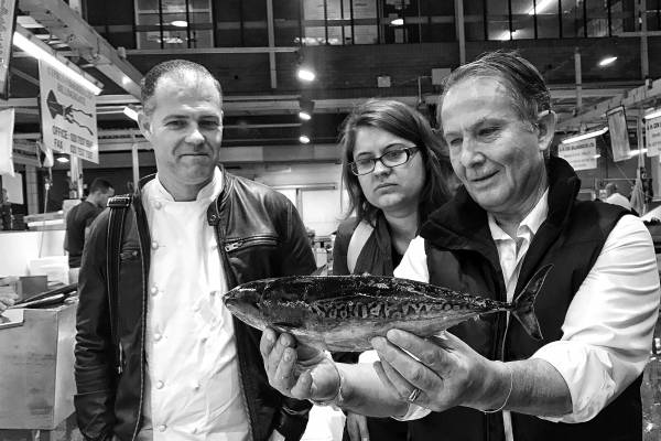 HoldingFishCompressed