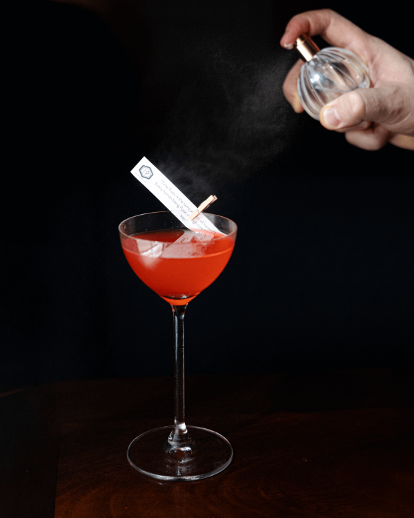 A red cocktail served at Lucky Cat as part of their 9 Lives menu 